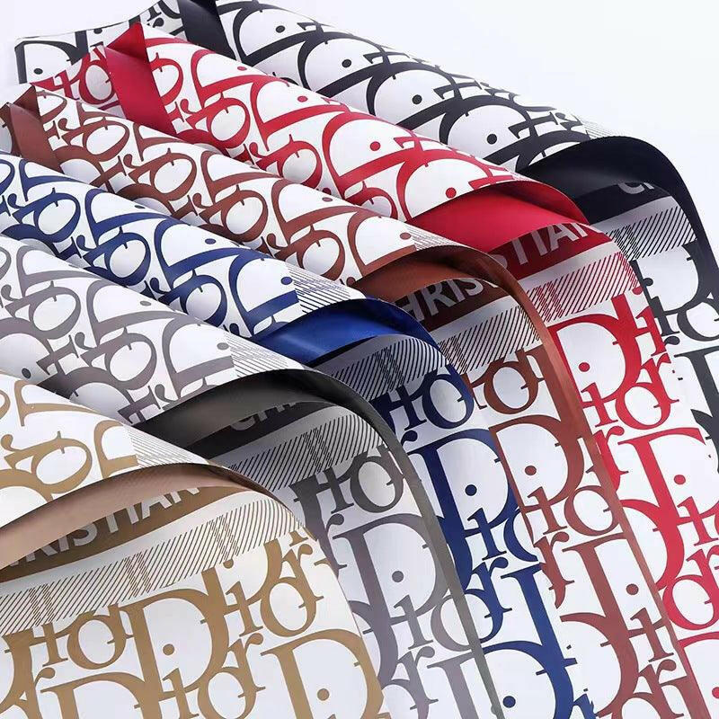Elegant Dior flower wrapping and gift paper showcasing luxury floral designs for premium gifting experiences.